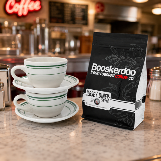 Two Jersey Diner coffee cup and saucer sets with a bag of Booskerdoo Jersey Diner-Style coffee.